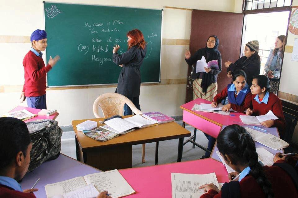 Ellen volunteer teaching at school for deaf and blind children.jpg