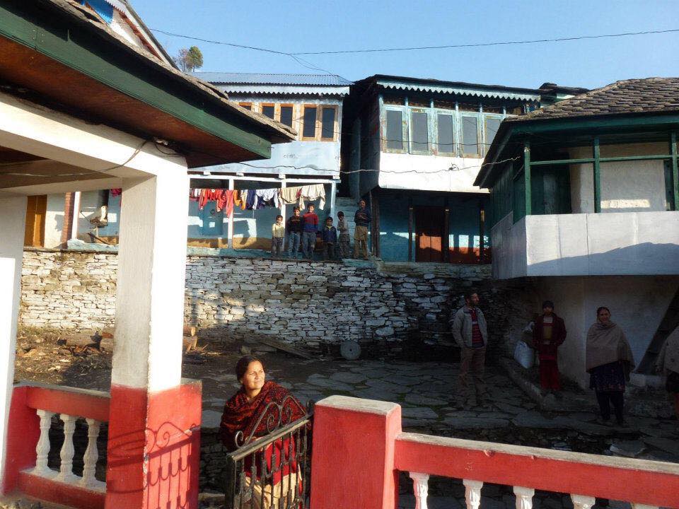 Photo Ellen took in India, showing young children gathering outside buildings.jpg