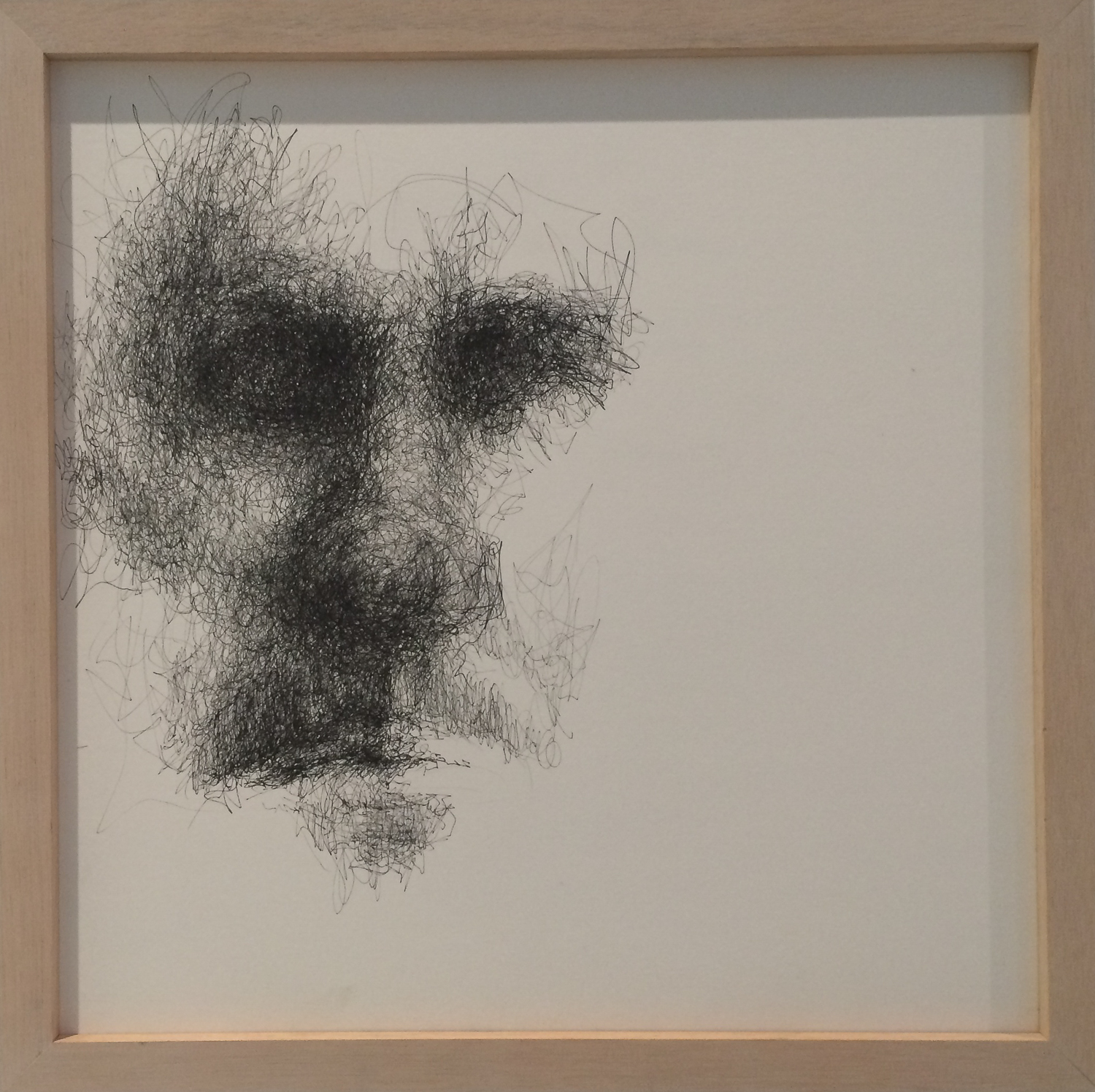 Ink on paper of a partially revealed face