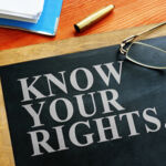 Photo of blackboard with words "Know your rights."