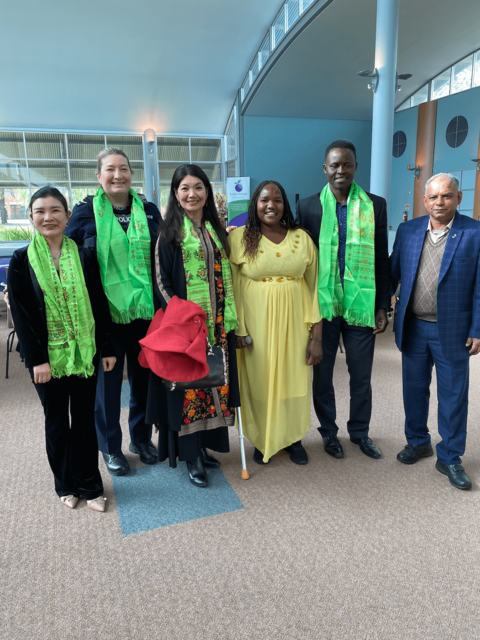 Group photo at Bhutanese Refugee Week event. Group photo with (Left to Right) - Support worker Emily, police officer Taryn Trevelion, Jing Lee, MLC (South Australia), JFA Purple Orange Project Officer Esther Simbi, Denis Yengi and Mohan Bhattarai